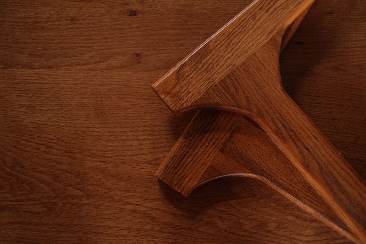 Detached wooden furniture legs on a wooden surface