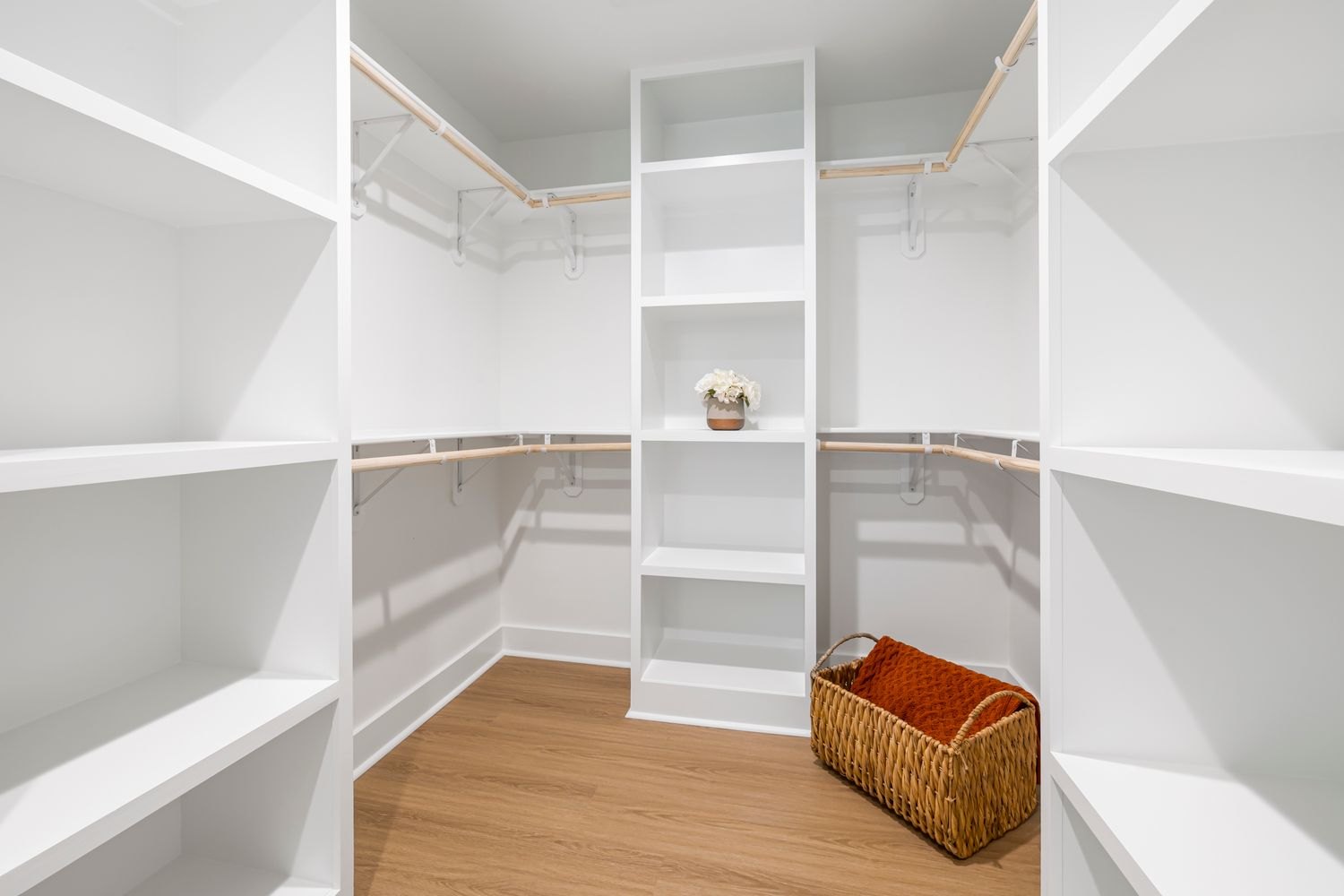 Open shelves and hanging rails in a storage space